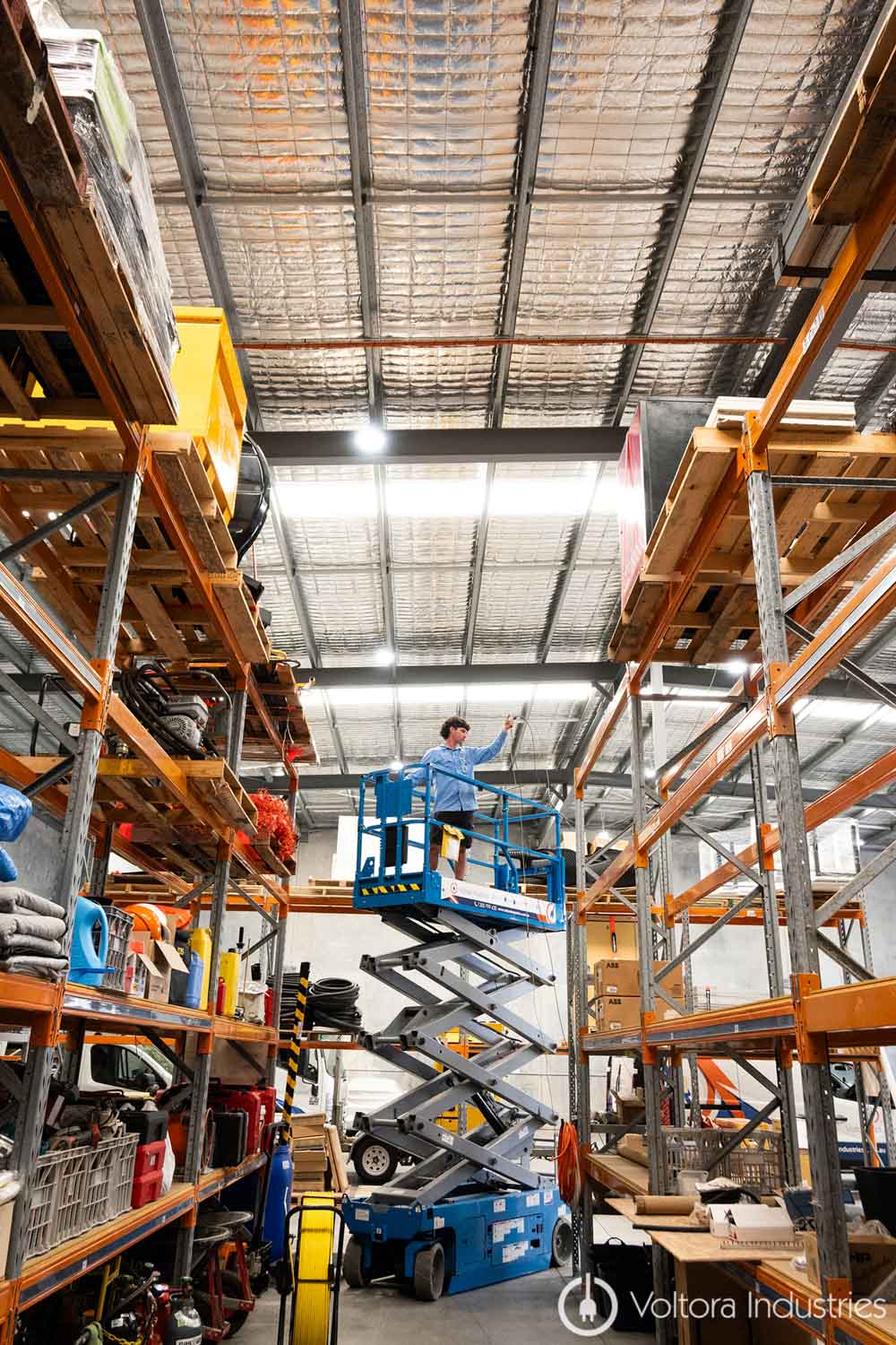 Genie GS-2632 scissor lift raised platform
