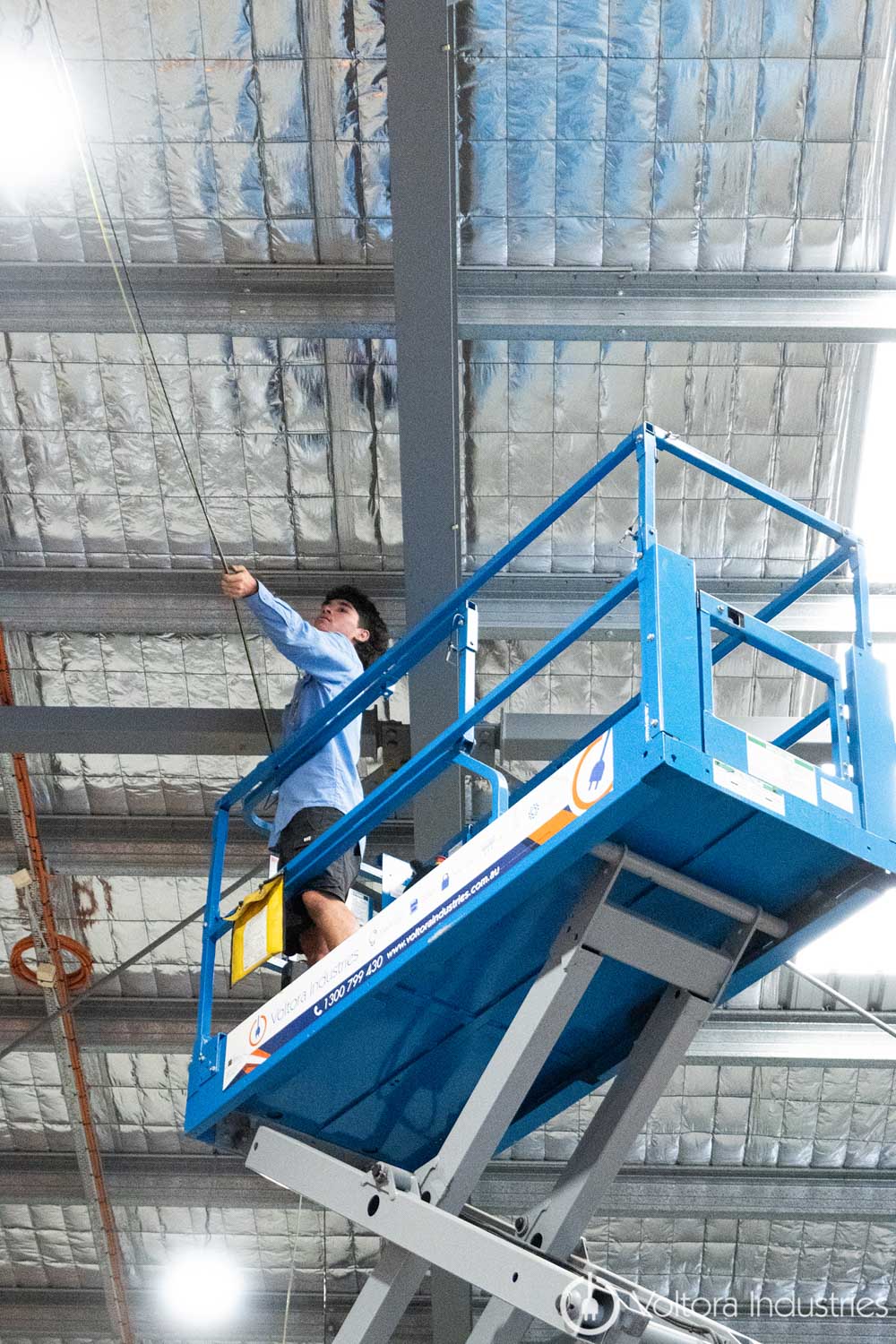 Genie GS-2632 scissor lift on trailer